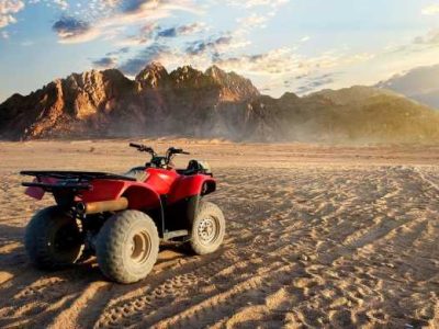 jeep crossing golden dunes during a Super Safari Trip Marsa Alam at sunset