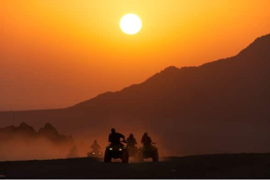 4x4 jeep crossing golden dunes during a Super Safari Trip Marsa Alam at sunset